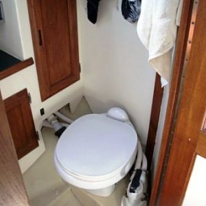 new manual toilet; I had to build/fiberglass a new floor under the new toilet (raised about 2")