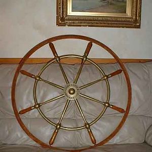 Image Brass wheel
Leather covered rim added to a turn of the Century Scottish made Wheel