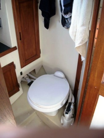 new manual toilet; I had to build/fiberglass a new floor under the new toilet (raised about 2")