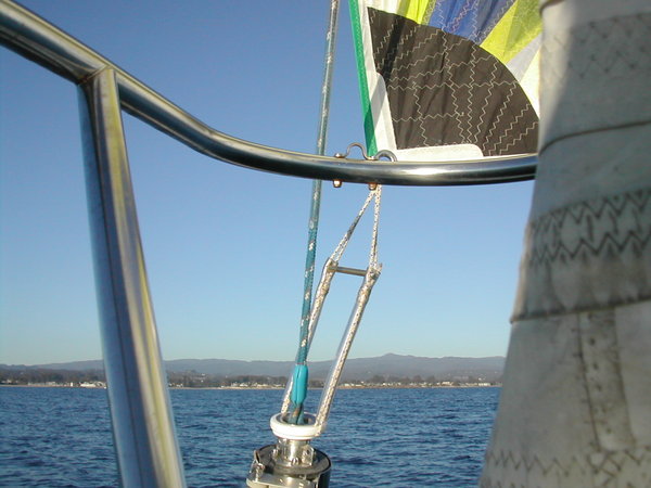 Spreader bar added to furling asymmetrical spinnaker tack. The sail furls from the head first. When the spinnaker is about 2/3rds furled the tack star